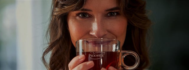 woman smiling cup tea header